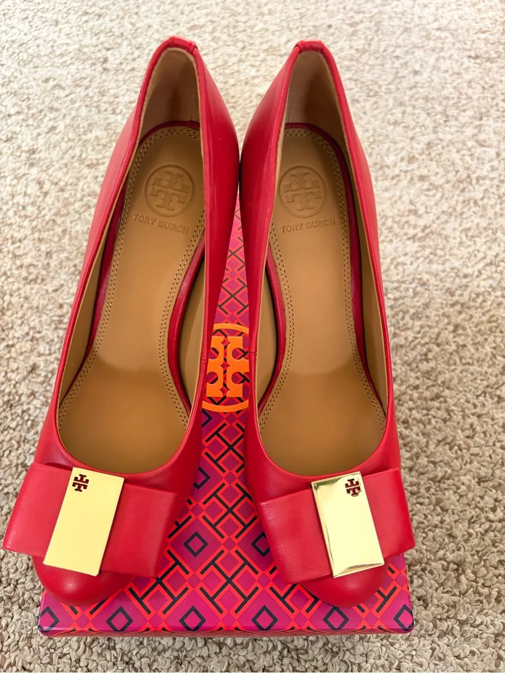 Tory Burch Red Leather Bow Pumps with Gold Plaque
